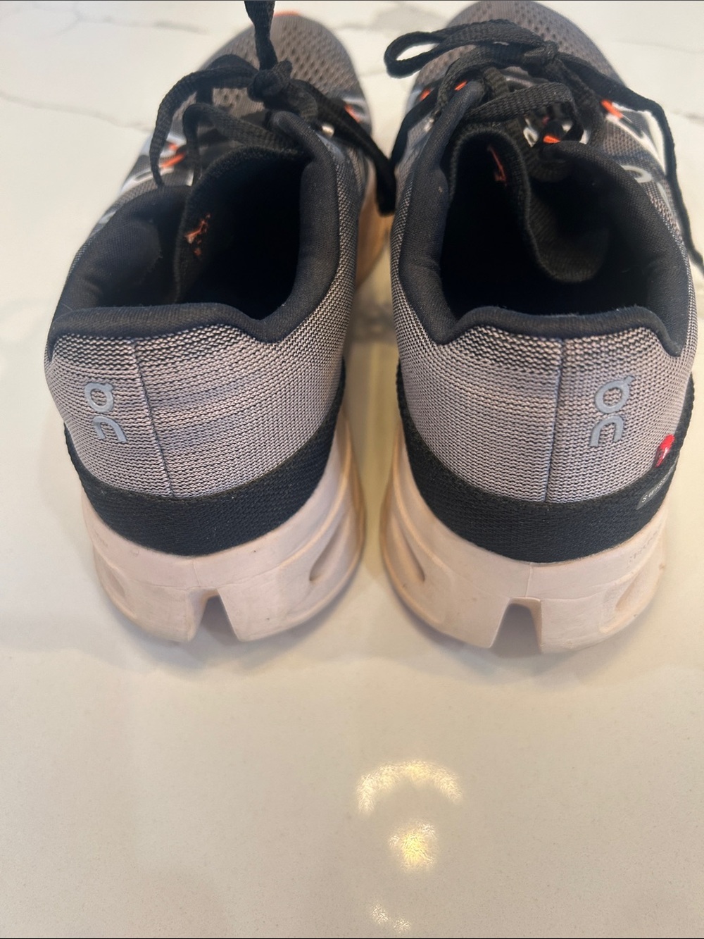 On Running Gray and Black Women's Running Sneakers with Orange Accents - Picture 6 of 6